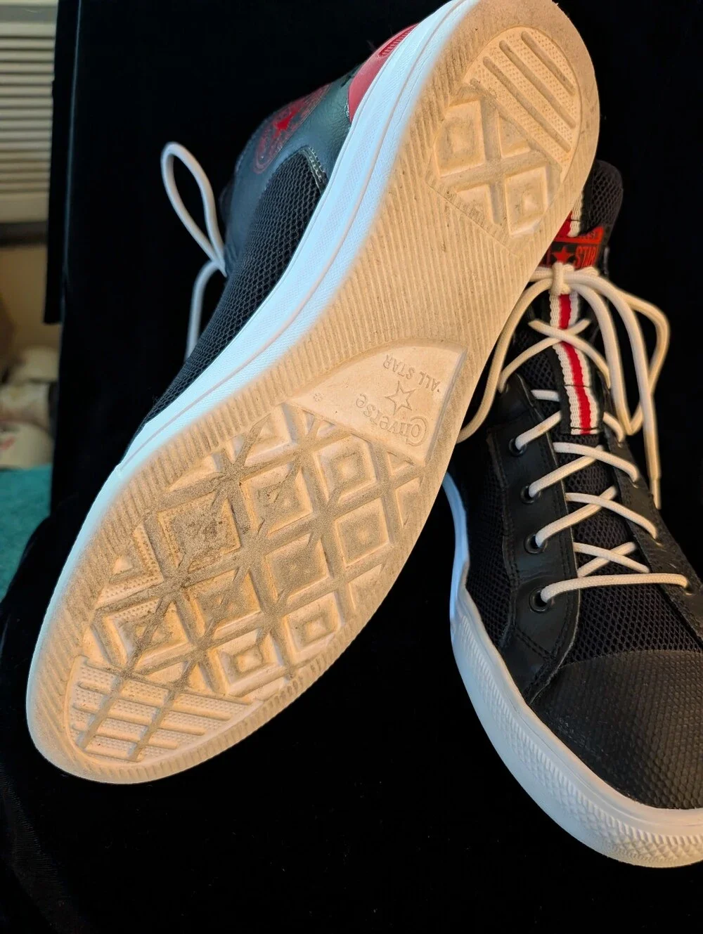 Converse Men’s Black High-Top Sneakers with White Laces and Red Stripe